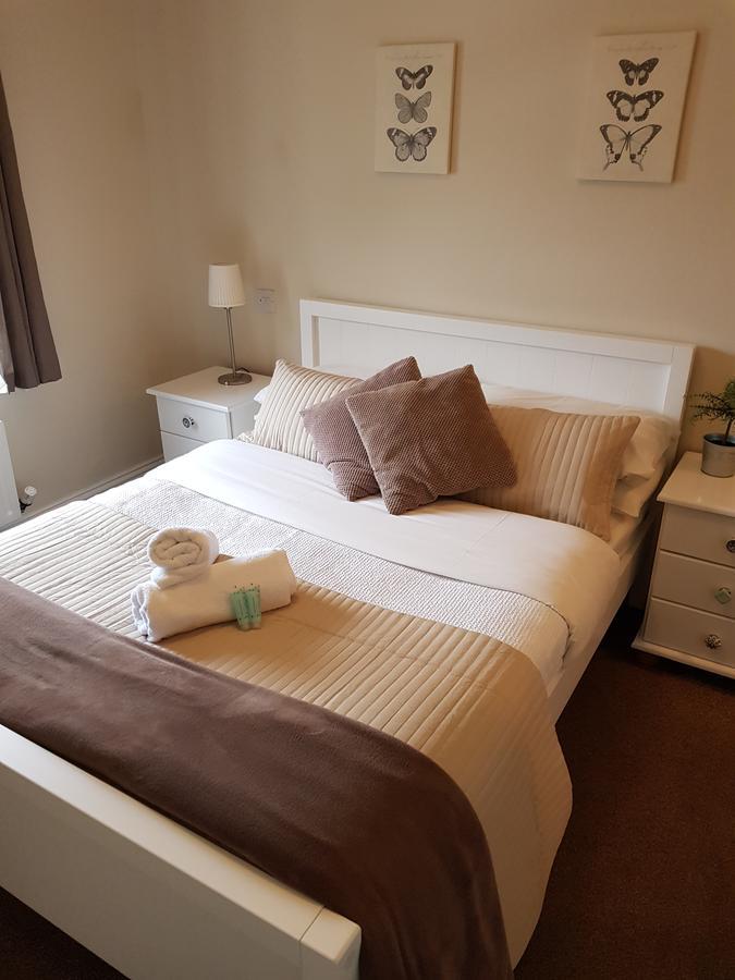 The Coach House Bed & Breakfast ราวด์วูด ห้อง รูปภาพ